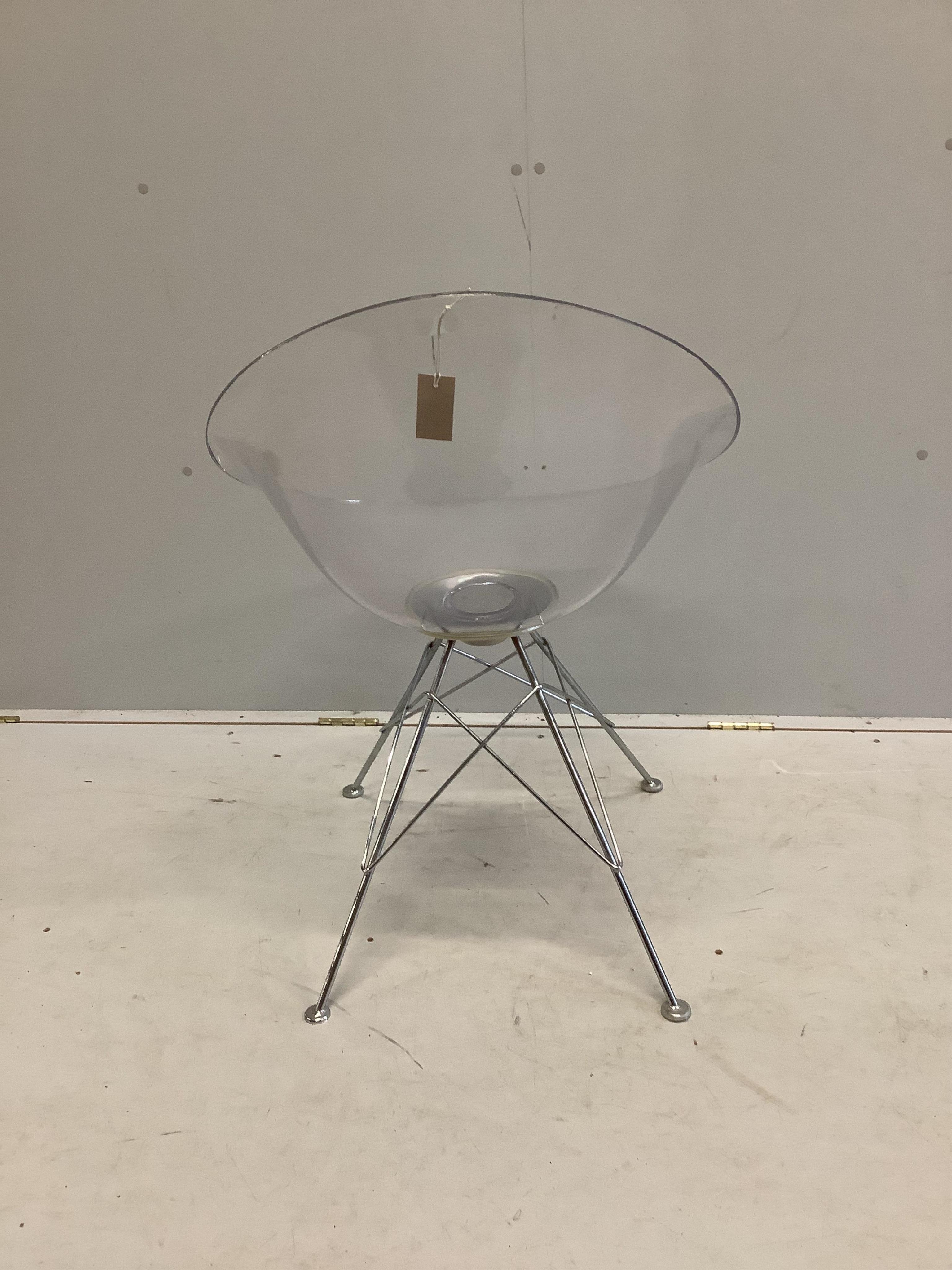 A Philip Starck style Eros transparent chair on “Eiffel Tower” base, width 61cm, depth 60cm, height 81cm. Condition - fair, minor chips and surface scratches.